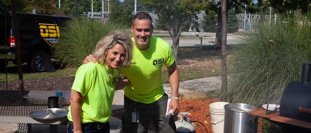 Man and woman at company picnic