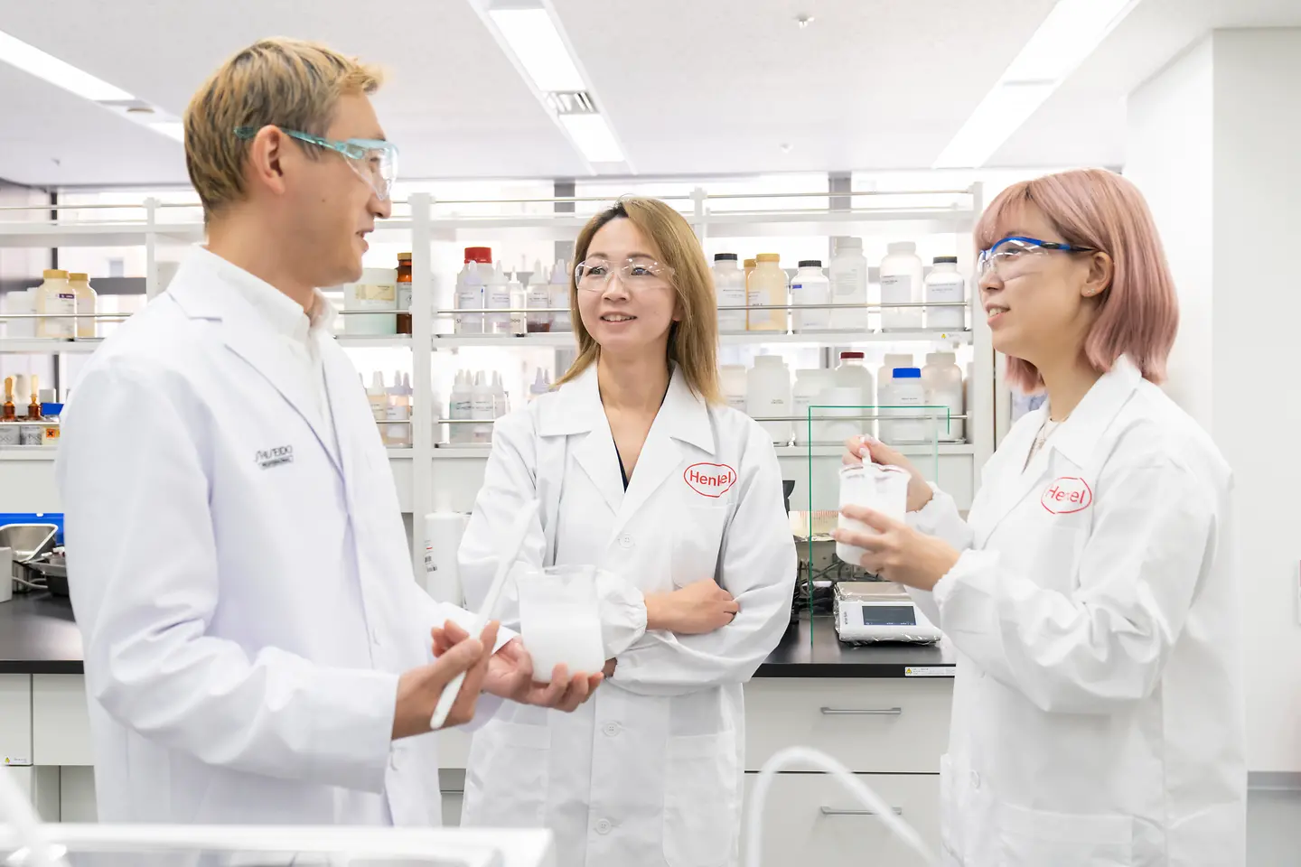 Three researchers in a lab.