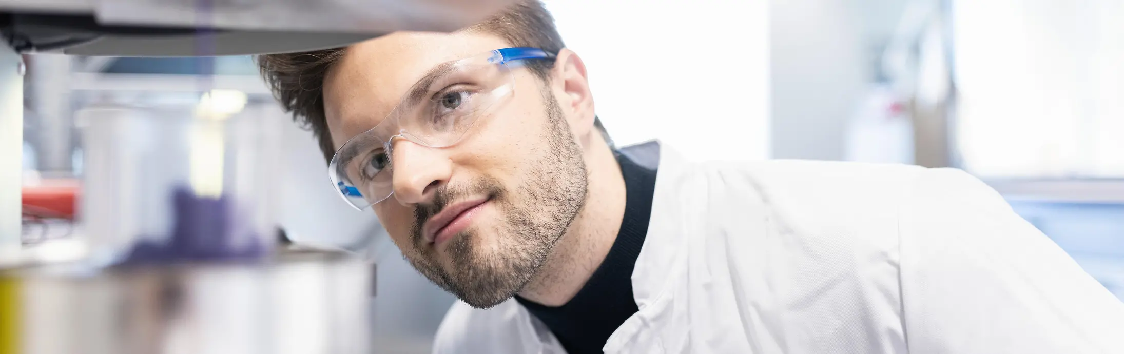 Male lab technician checks rheology