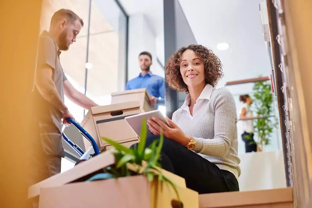 Woman with moving boxes 