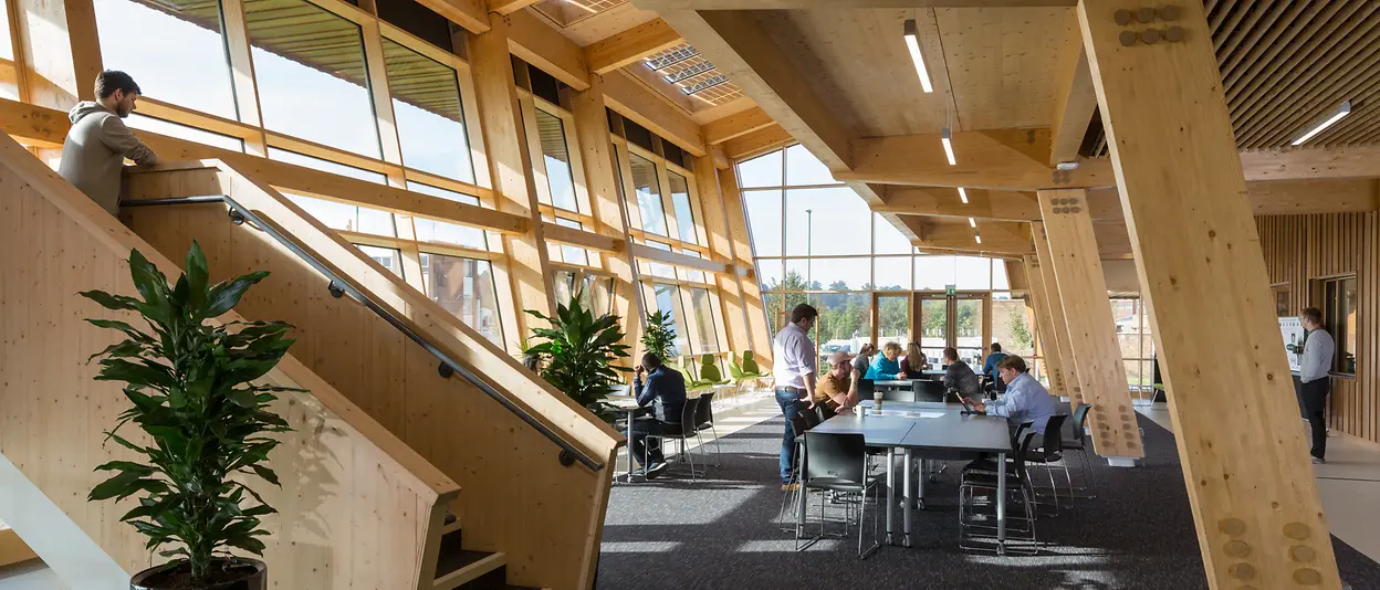 Interior of a building with a wooden structure.