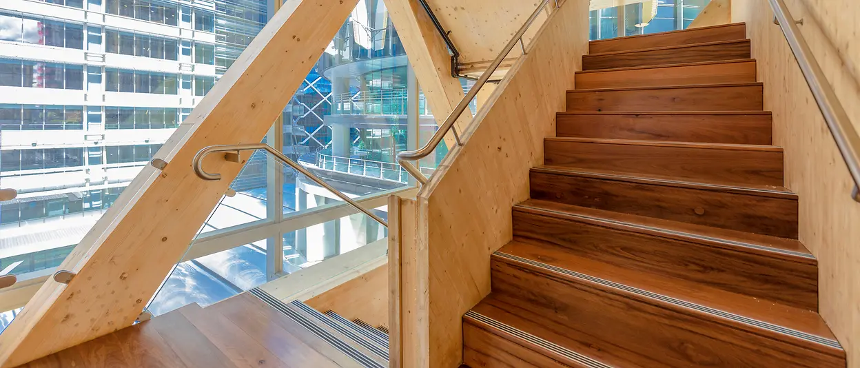 View of a staircase in a building constructed with wood.