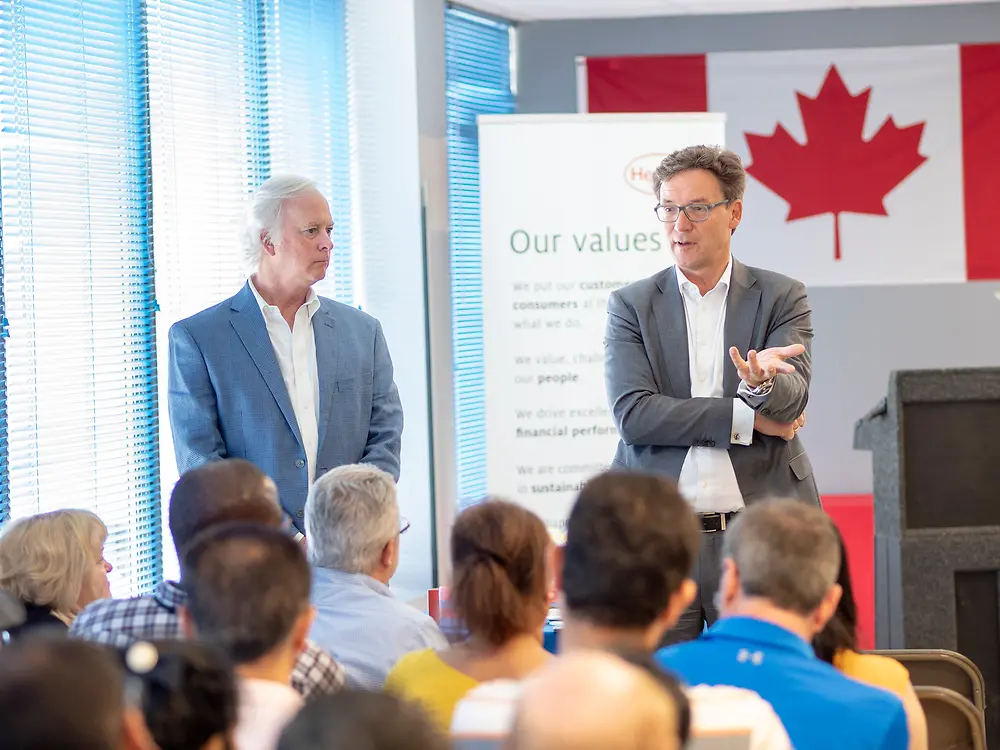 Steve Miller, and Stephan Fuesti-Molnar speak to employees at the Town Hall presentation in Concord.